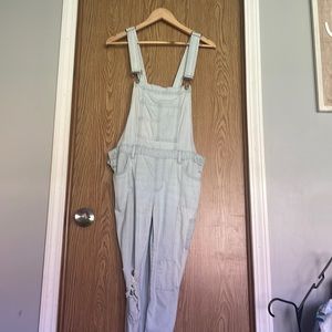 Light washed Jean overalls.